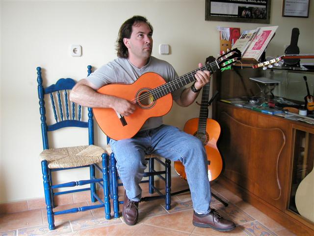 Prof. Marqus checks out a guitar